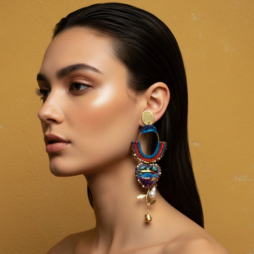 Colorful beaded earring on a textured gray background