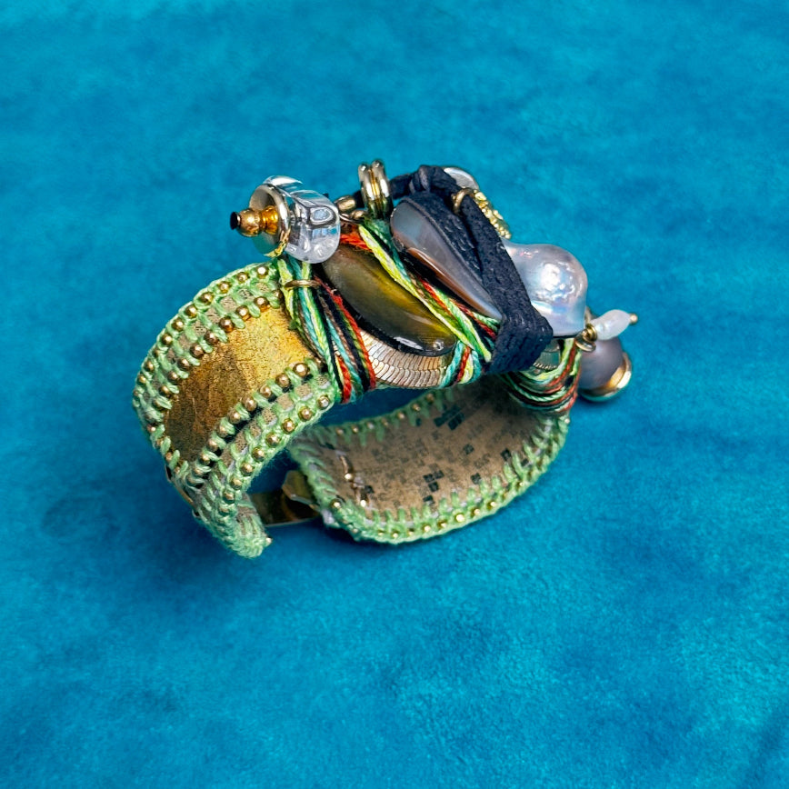 Decorative ring with intricate design on a blue background