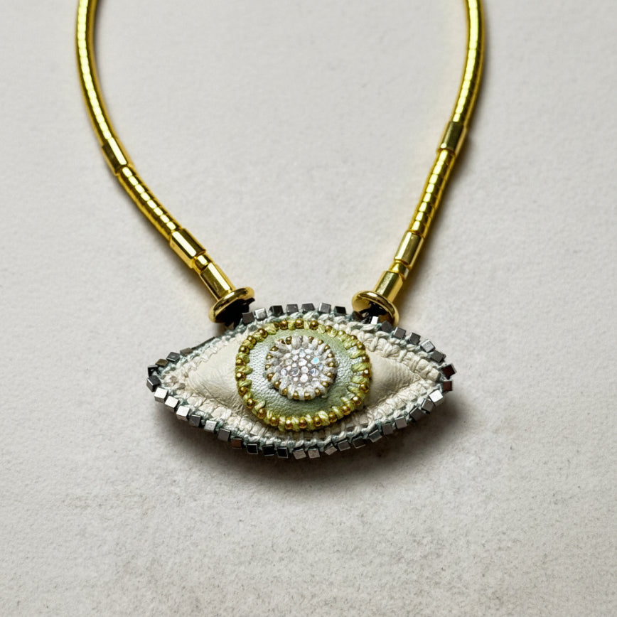 The Cosmic Eye — Crystal Quartz & Hematite Talisman Necklace | Handmade | De Petra