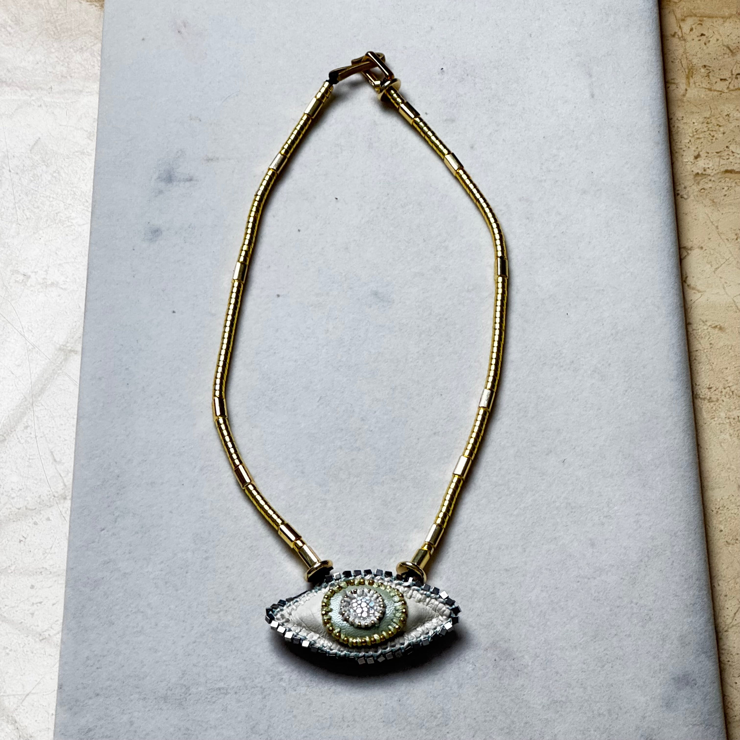 The Cosmic Eye — Crystal Quartz & Hematite Talisman Necklace | Handmade | De Petra