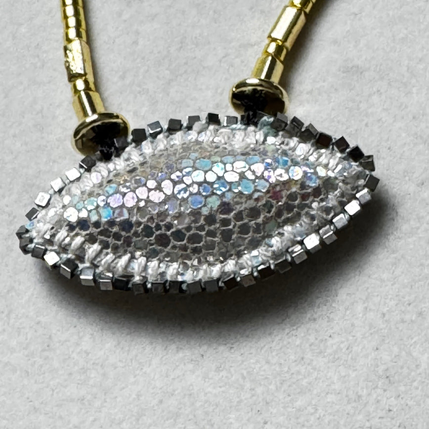 The Cosmic Eye — Crystal Quartz & Hematite Talisman Necklace | Handmade | De Petra