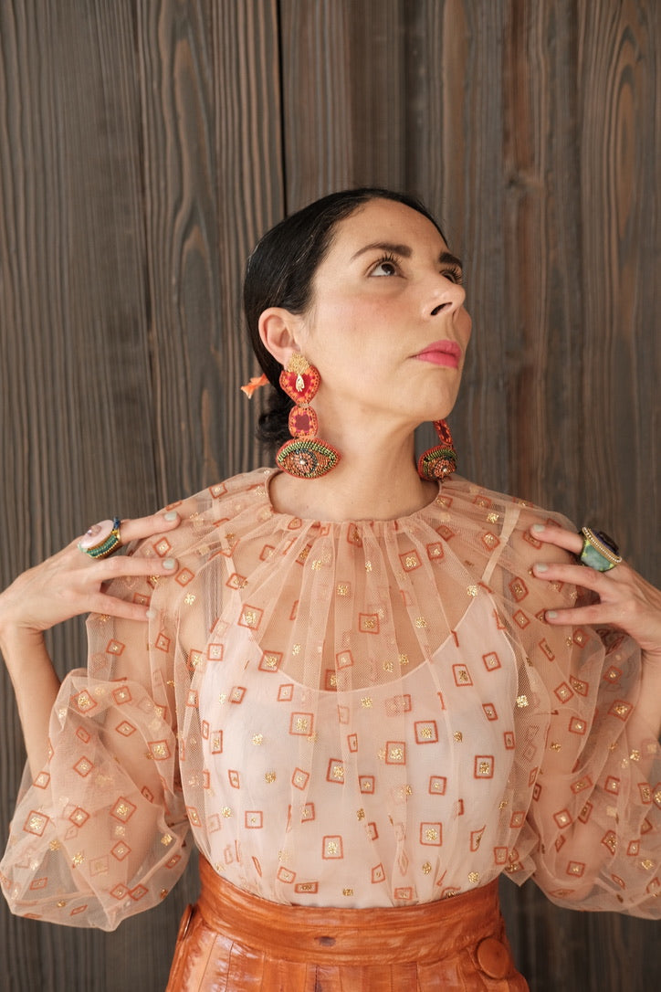 Lorena  Medinilla is modeling her crations for De Petra.